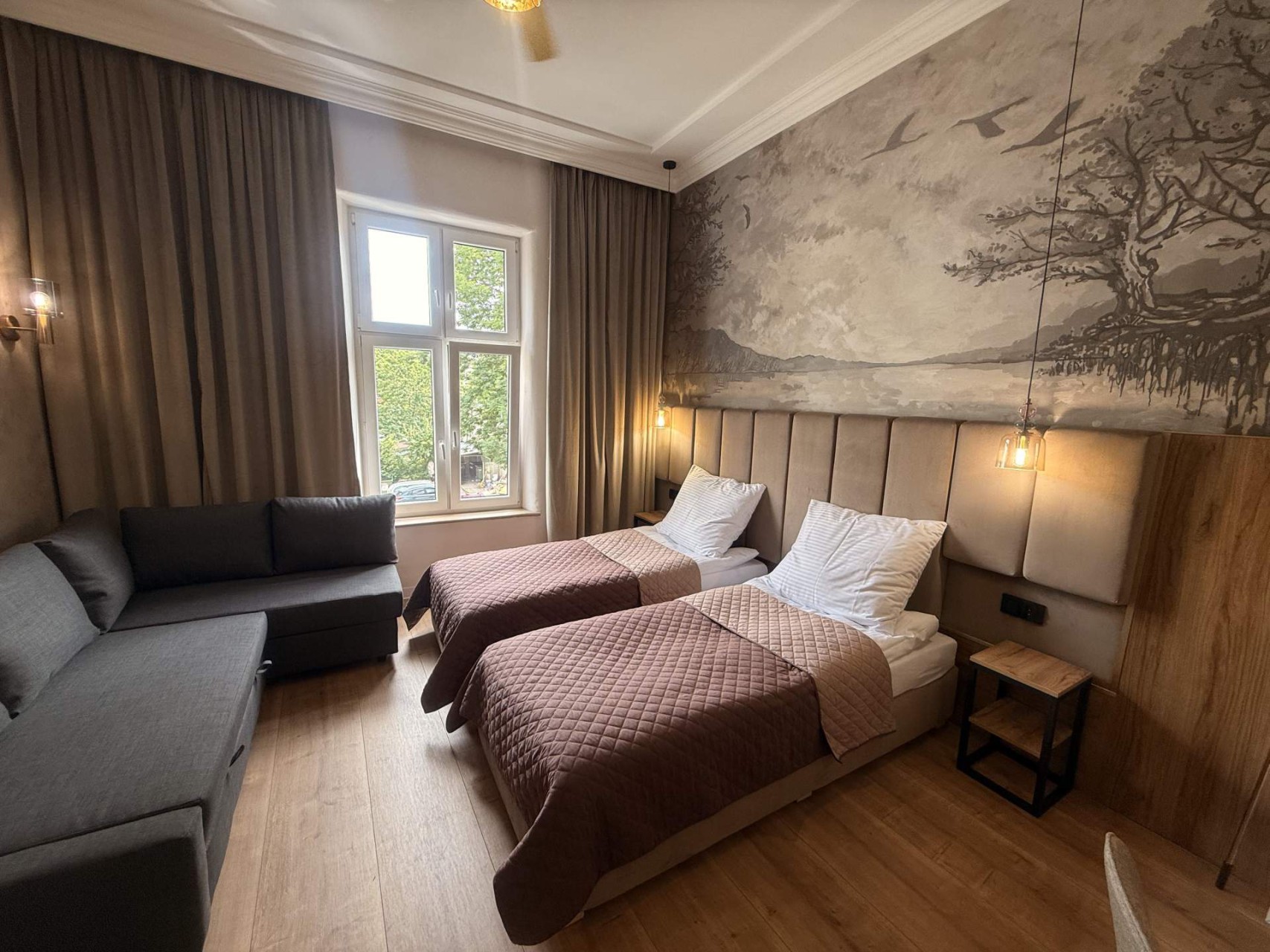 Przykładowe wnętrze typu Apartament Mazurski z sofą